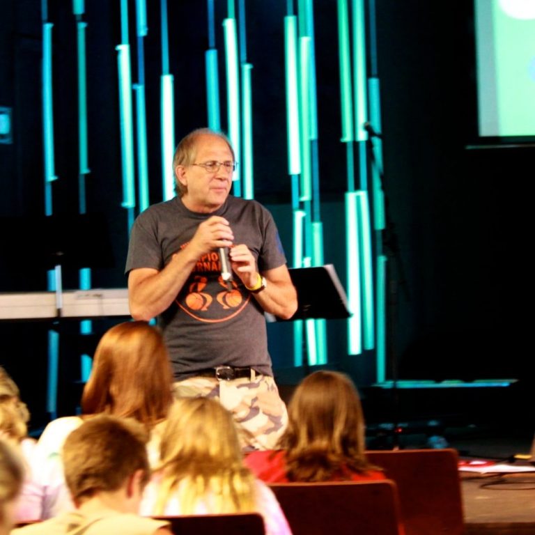 Chuck speaking at a youth gathering